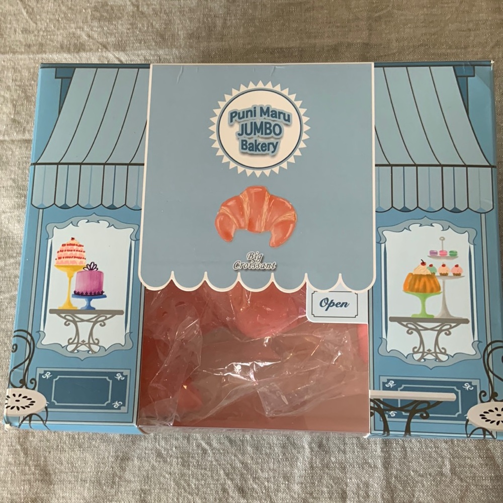 Puni Maru big croissant. Strawberry scented squishy. New in box.